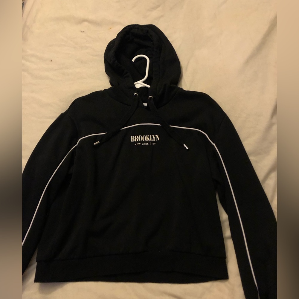 Divided black Brooklyn hoodie. Size L